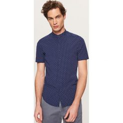 Koszula super slim fit - Granatowy. Niebieskie koszule męskie Reserved, s, bez wzorów, bez kołnierzyka, bez rękawów. W wyprzedaży za 29,99 zł.