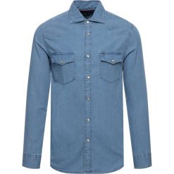Koszula TOMMY HILFIGER Organic Cotton Denim MW0MW11870. Niebieskie koszule męskie TOMMY HILFIGER, xl, bez wzorów, z bawełny, casualowe, bez kołnierzyka, bez rękawów. W wyprzedaży za 229,00 zł.