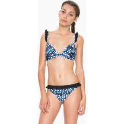 Biustonosz bikini "Atlantis" w kolorze niebiesko-białym. Białe biustonosze sportowe damskie marki Desigual Sport. W wyprzedaży za 125,95 zł.