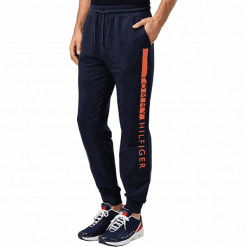 Tommy Hilfiger Spodnie dresowe UM0UM01177-416 Navy Blaze r (rozmiar M). Niebieskie jeansy męskie TOMMY HILFIGER, m, bez wzorów. W wyprzedaży za 248,00 zł.