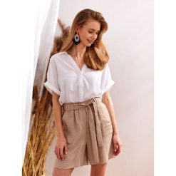 Bluzka długi rękaw o luźnym kroju, z rękawem kimono. Białe bluzki damskie Top Secret, bez wzorów, eleganckie, z dekoltem w serek, z długim rękawem. Za 79,99 zł.