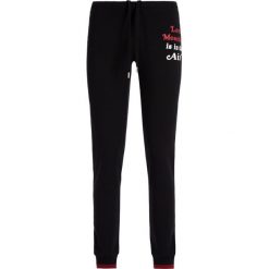 Spodnie dresowe LOVE MOSCHINO W142412E 1958. Szare spodnie damskie Love Moschino, z elastanu. W wyprzedaży za 409,00 zł.