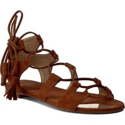 Sandały STUART WEITZMAN - Romanflat Amaretto Suede. Pomarańczowe klapki damskie marki Stuart Weitzman, bez wzorów, ze skóry, bez obcasa, na obcasie. W wyprzedaży za 999,00 zł.