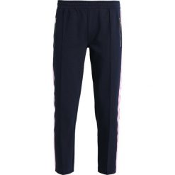 Marc O'Polo DENIM TRACK PANTS Spodnie treningowe lunar blue. Niebieskie spodnie damskie marki Marc O'Polo DENIM, xl, z bawełny. Za 429,00 zł.