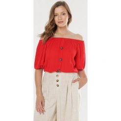 Czerwona Bluzka Evalia. Czerwone bluzki damskie Born2be, xl, bez wzorów, bez kołnierzyka, bez rękawów. W wyprzedaży za 39,99 zł.