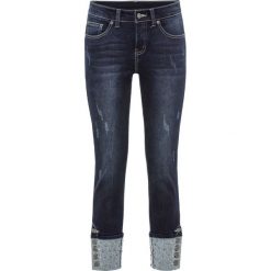 Dżinsy Skinny z wywiniętymi nogawkami i ćwiekami bonprix ciemny denim. Niebieskie jeansy damskie skinny marki bonprix, z denimu. Za 179,99 zł.