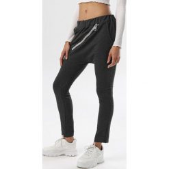 Ciemnoszare Spodnie Adrealin. Szare spodnie damskie Born2be, xl, z dresówki. W wyprzedaży za 69,99 zł.
