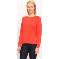 BLUZA NIEROZPINANA DAMSKA GŁADKA. Czerwone bluzy damskie TROLL, xs, bez wzorów, z dzianiny, z długim rękawem, długie, bez kaptura. W wyprzedaży za 39,99 zł.