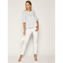 Bluzka Tommy Jeans Tjw Sleeve Bow Detal DW0DW07934. Niebieskie bluzki damskie Tommy Jeans, s, bez wzorów, z bawełny, bez kołnierzyka, bez rękawów. Za 349,00 zł.