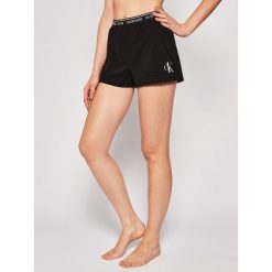 Szorty piżamowe Calvin Klein Underwear Lounge 000QS6428E. Czarne piżamy damskie Calvin Klein Underwear, m, bez wzorów, z elastanu, bez rękawów. Za 159,00 zł.