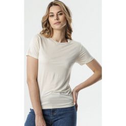 Kremowy T-shirt Rhene. Brązowe t-shirty damskie Born2be, m, bez wzorów, z dresówki, z okrągłym kołnierzem, z krótkim rękawem. Za 39,99 zł.