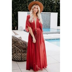 Tunika plażowa JIMENA RED. Czerwone tuniki plażowe damskie Tunika plażowa JIMENA RED, s, bez wzorów, bez rękawów. W wyprzedaży za 69,00 zł.