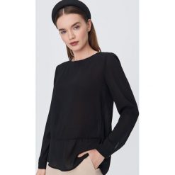 Lekka bluzka o dłuższym kroju - Czarny. Czarne bluzki damskie Sinsay, s, bez wzorów, bez kołnierzyka, bez rękawów. Za 39,99 zł.