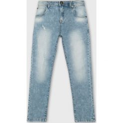 Blukids - Jeansy dziecięce 140-170 cm. Niebieskie spodnie chłopięce Blukids, bez wzorów, z elastanu. W wyprzedaży za 59,90 zł.