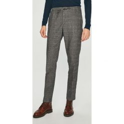 Tommy Hilfiger - Spodnie. Szare spodnie męskie TOMMY HILFIGER, na co dzień, xl, bez wzorów, z elastanu, casualowe. W wyprzedaży za 359,90 zł.