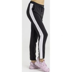 SPODNIE DRESOWE liu jo sport. Czarne spodnie damskie Liu Jo Sport, m, z dresówki, sportowe. Za 589,00 zł.