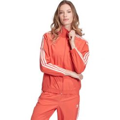 Adidas Originals Kurtka Czerwony. Czerwone kurtki damskie adidas Originals, bez wzorów, z materiału. Za 266,95 zł.