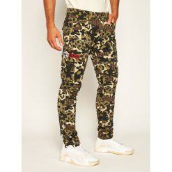 Spodnie materiałowe Tommy Jeans Tjm Scanton Cargo DM0DM07827. Zielone jeansy męskie Tommy Jeans, m, bez wzorów. W wyprzedaży za 379,00 zł.