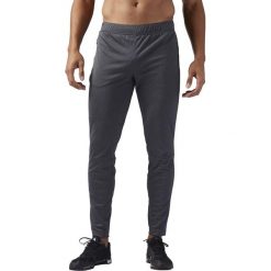 SPODNIE REEBOK SPEEDWICK KNIT (XXL). Spodnie męskie Reebok, do pracy, xxl, bez wzorów, ze skóry, biznesowe. W wyprzedaży za 159,99 zł.