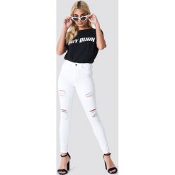 Trendyol Jeansy skinny z rozdarciami - White. Białe jeansy damskie skinny marki Trendyol. Za 141,95 zł.