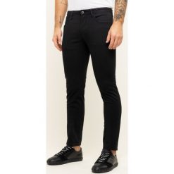 Jeansy Slim Fit Emporio Armani 3H1J06 1N4ZZ 0999. Czarne jeansy męskie Emporio Armani, m, bez wzorów, z elastanu. W wyprzedaży za 449,00 zł.