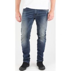 Diesel Thavar Dżinsy Niebieski. Niebieskie jeansy męskie Diesel, bez wzorów, vintage. Za 1050,95 zł.