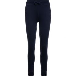 Spodnie dresowe Tommy Jeans Classics DW0DW04575. Niebieskie spodnie damskie Tommy Jeans, xs, z bawełny. W wyprzedaży za 249,00 zł.