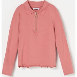 Bluza z prążkowanej dzianiny z suwakiem - Różowy. Różowe bluzy damskie Reserved, bez wzorów, z dzianiny, bez rękawów, bez kaptura. W wyprzedaży za 19,99 zł.