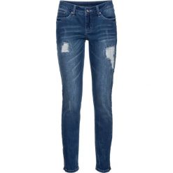 Dżinsy Skinny z zamkami bonprix niebieski "stone”. Niebieskie jeansy damskie marki bonprix, z jeansu. Za 129,99 zł.
