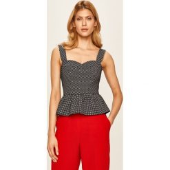 Guess Jeans - Bluzka. Niebieskie bluzki damskie Guess Jeans, s, z aplikacjami, z elastanu, bez kołnierzyka, bez rękawów. Za 329,90 zł.