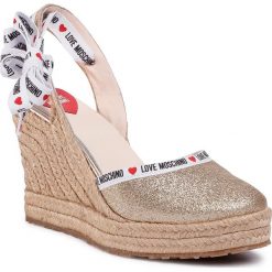 Espadryle LOVE MOSCHINO - JA1047AI0AJJ0900 Glitter Platino. Żółte espadryle damskie Love Moschino, z aplikacjami, ze skóry, bez obcasa, na obcasie. Za 1049,00 zł.