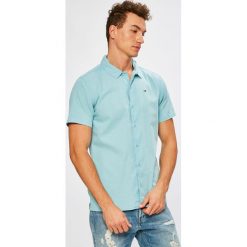Tommy Jeans - Koszula. Niebieskie koszule męskie marki Tommy Jeans, s, z bawełny, klasyczne, z klasycznym kołnierzykiem, z krótkim rękawem. W wyprzedaży za 179,90 zł.