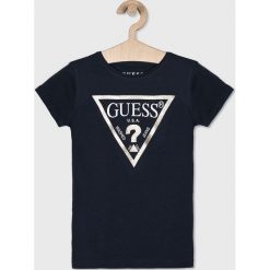 Guess Jeans - Top dziecięcy 118-175 cm. Niebieskie bluzki dziewczęce Guess Jeans, z nadrukiem, z bawełny, z okrągłym kołnierzem, z krótkim rękawem, krótkie, bez kaptura. W wyprzedaży za 59,90 zł.