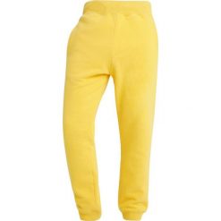 Napapijri MACAU Spodnie treningowe spark yellow. Żółte spodnie dresowe męskie marki Napapijri, m, z bawełny. Za 389,00 zł.