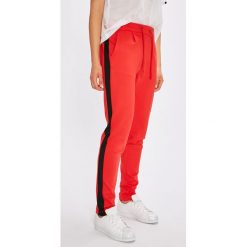 Jacqueline de Yong - Spodnie Tracky. Niebieskie spodnie damskie Jacqueline de Yong, s, bez wzorów, z elastanu, casualowe. W wyprzedaży za 59,90 zł.