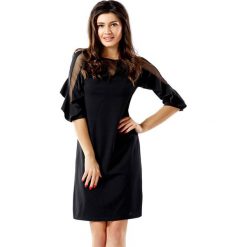 Sukienka w kolorze czarnym. Czarne sukienki damskie Far Far Fashion, Ryłko by Agnes&Paul, bez wzorów, z okrągłym kołnierzem, bez rękawów. W wyprzedaży za 109,95 zł.