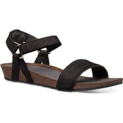 Teva Sandały damskie Mahonia Stich 39 czarny. Czarne sandały damskie Teva, bez wzorów, ze skóry, eleganckie, na wysokim obcasie, bez zapięcia. Za 379,00 zł.