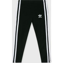 Adidas Originals - Legginsy dziecięce 104-128 cm. Czarne spodnie dziewczęce adidas Originals, bez wzorów, z elastanu. W wyprzedaży za 79,90 zł.