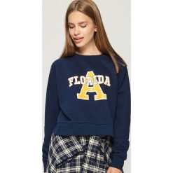 Bluza z koszulowym dołem - Granatowy. Niebieskie bluzy damskie marki Sinsay, l. W wyprzedaży za 49,99 zł.