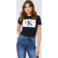 Calvin Klein T-shirt Tanya 40 Crew Neck - Black. Czarne t-shirty damskie Calvin Klein, bez wzorów, z bawełny, bez kołnierzyka. Za 202,95 zł.
