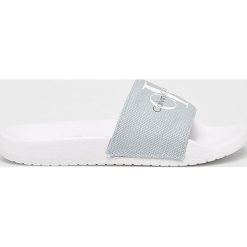 Calvin Klein Jeans - Klapki. Niebieskie klapki damskie marki Calvin Klein Jeans, z jeansu. Za 239,90 zł.