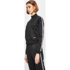 Hummel - Bluza. Czarne bluzy damskie Hummel, s, z nadrukiem, z bawełny, bez rękawów, bez kaptura. W wyprzedaży za 179,90 zł.