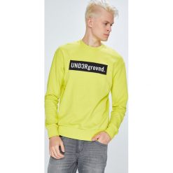 Jack & Jones - Bluza. Żółte bluzy męskie Jack & Jones, s, z nadrukiem, z bawełny, z okrągłym kołnierzem, bez rękawów, bez kaptura. W wyprzedaży za 89,90 zł.