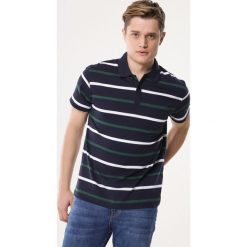 Granatowo-Zielona Koszulka Swordcraft. Niebieskie koszulki męskie Born2be, xl, bez wzorów, z dzianiny, polo, bez rękawów. Za 49,99 zł.