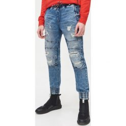 Joggery slim - Niebieski. Niebieskie spodnie męskie Cropp, m, z jeansu. Za 149,99 zł.