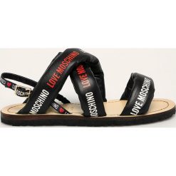 Love Moschino - Sandały. Czarne klapki damskie Love Moschino, bez wzorów, z gumy, bez obcasa, na obcasie. W wyprzedaży za 499,90 zł.