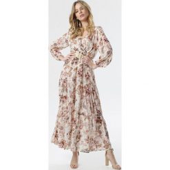 Biała Sukienka Esmay. Białe sukienki damskie Born2be, s, w kwiaty, z okrągłym kołnierzem, z długim rękawem, długie, maxi, rozkloszowane. Za 129,99 zł.