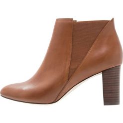 KIOMI Ankle boot cognac. Brązowe botki damskie na zamek KIOMI, z materiału. Za 379,00 zł.
