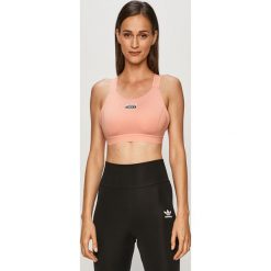Adidas Originals - Biustonosz sportowy. Różowe biustonosze sportowe damskie adidas Originals, z aplikacjami, z elastanu. Za 79,90 zł.