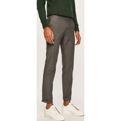 Tommy Hilfiger - Spodnie. Niebieskie spodnie męskie z bawełny, casualowe. W wyprzedaży za 299,90 zł.